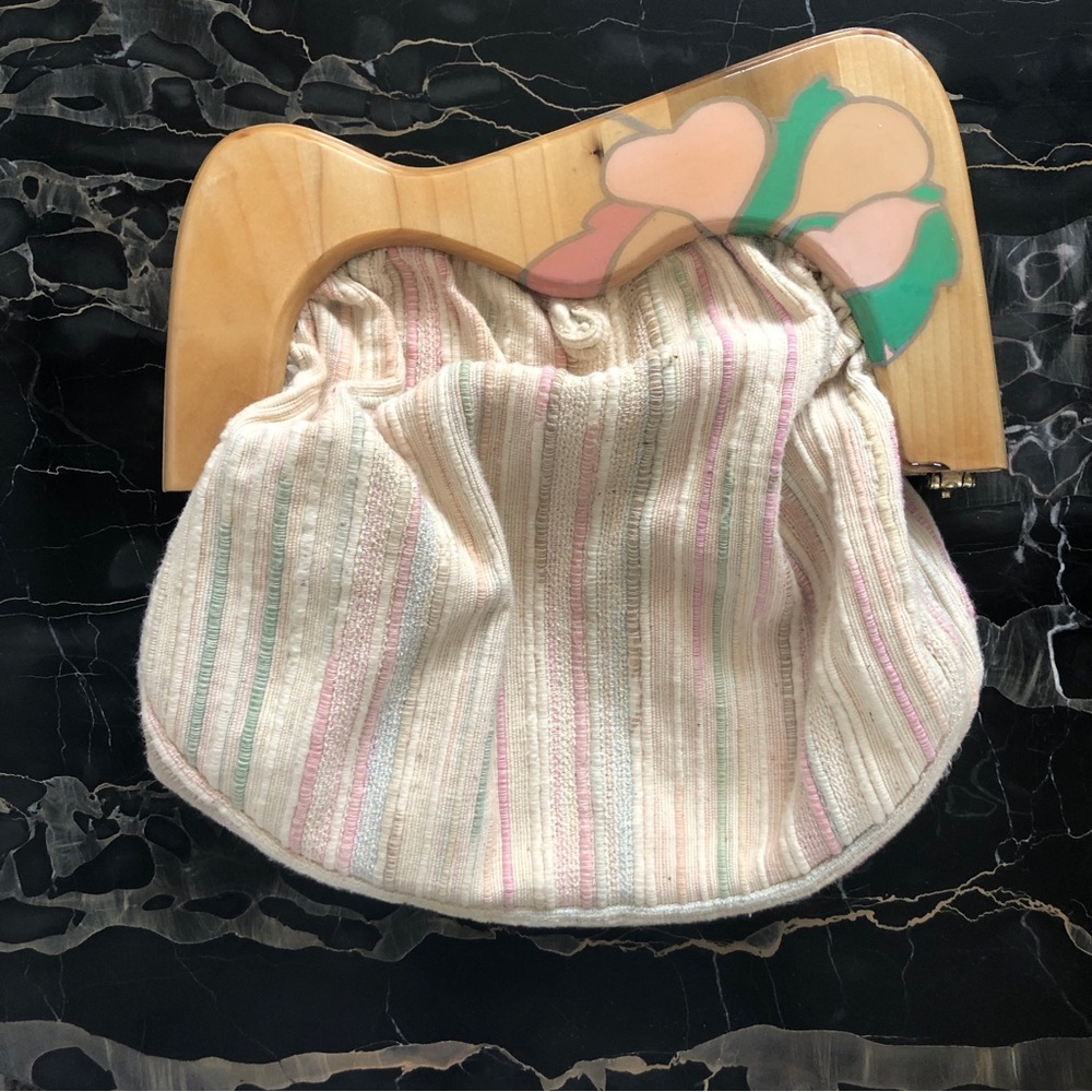 Hand carved, hand painted clutch.